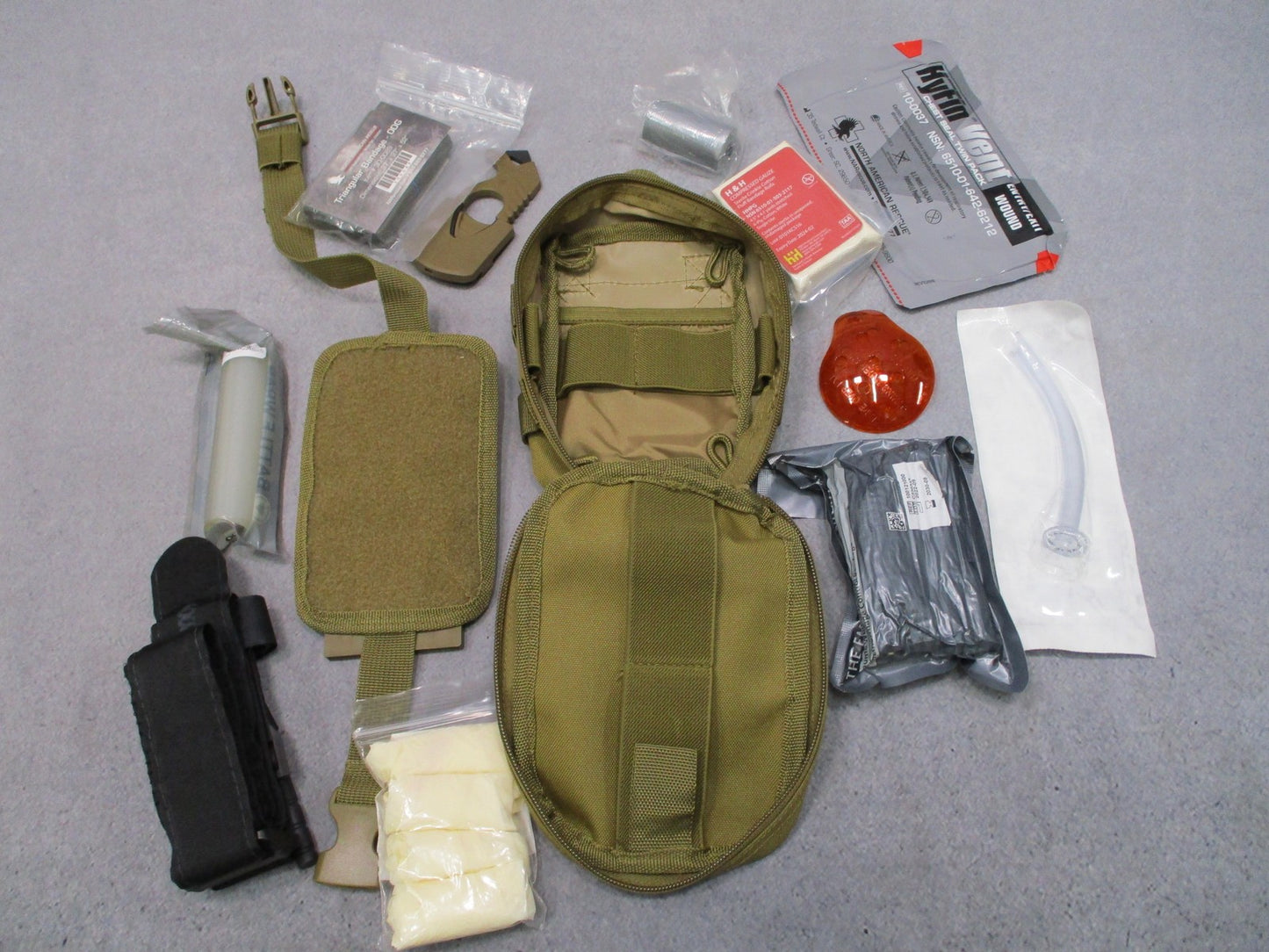Coyote Tan Custom IFAK MOLLE Pouch Supplies Included No tagged size visible
