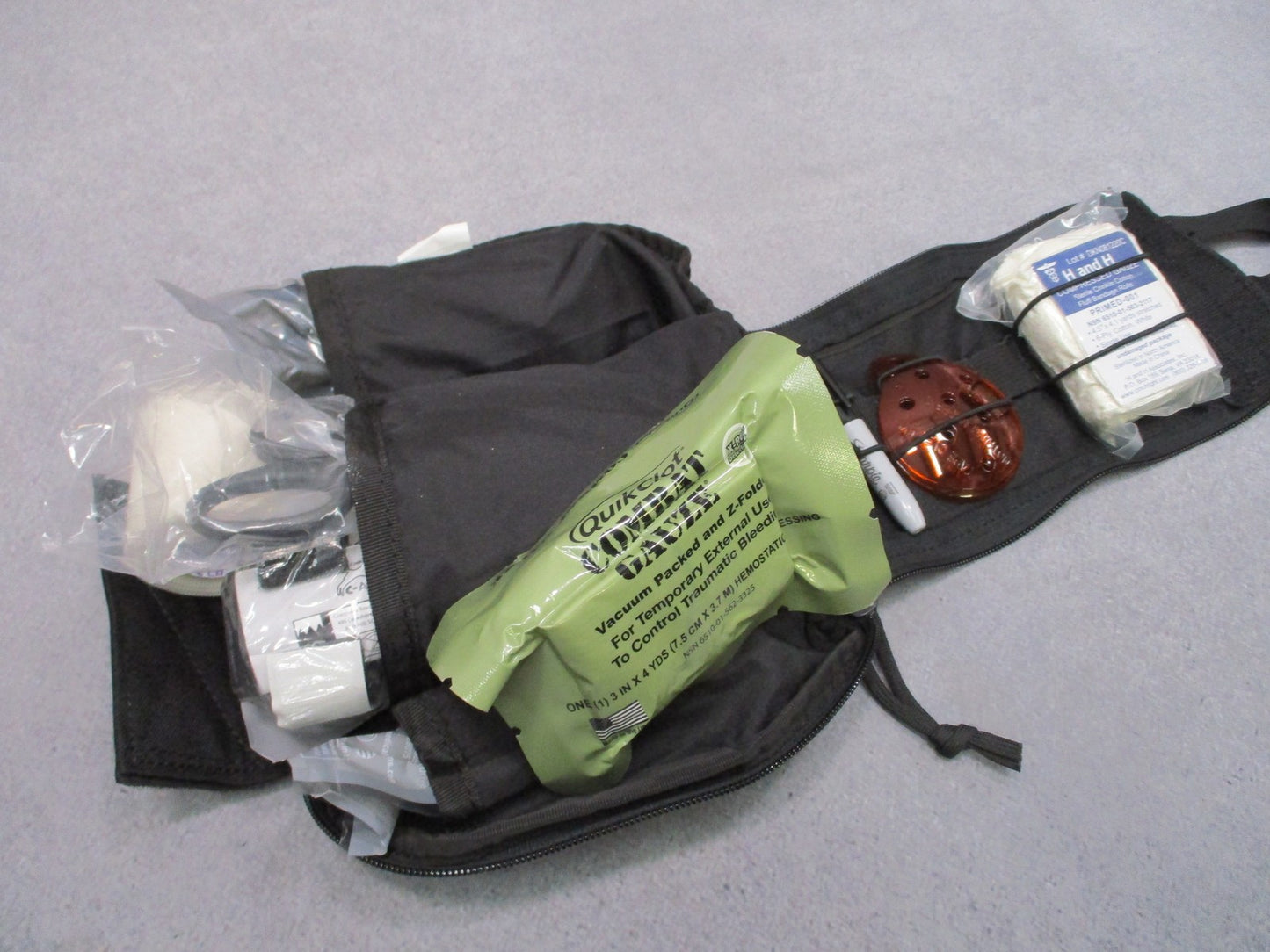 Tactical IFAK Medical Pouch Kit w/ Tourniquet, Chest Seal, Gauze & Trauma Supply