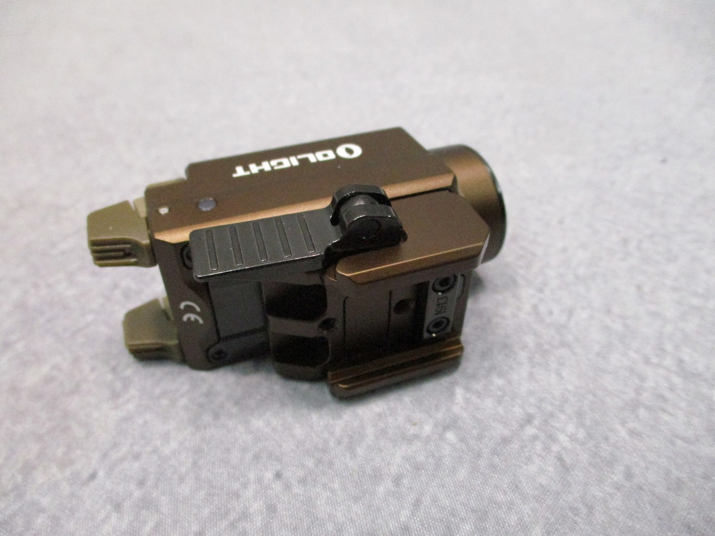 Olight Baldr S Weapon Light 800 Lumens Green Laser Desert Tan Excellent