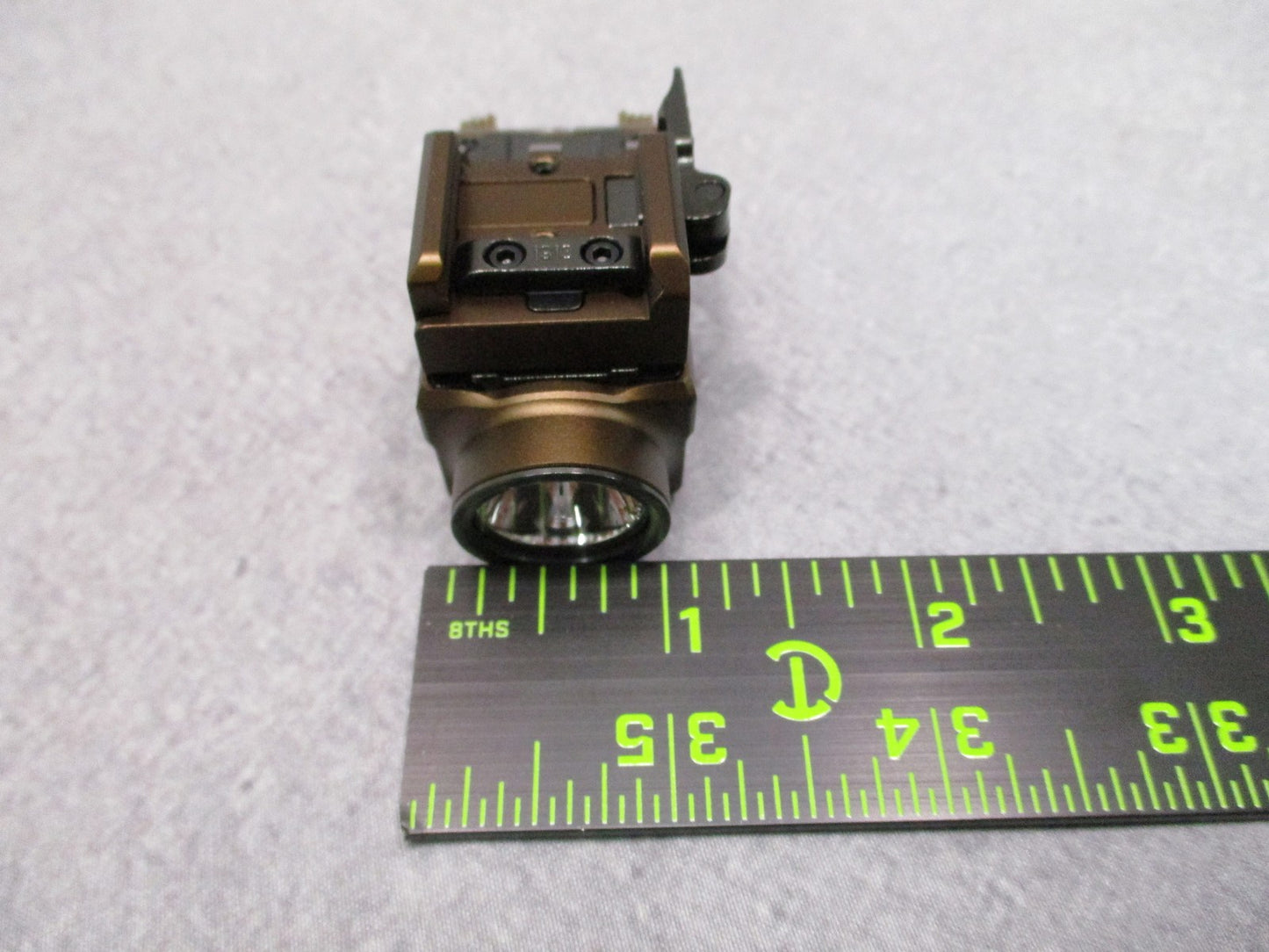 Olight Baldr S Weapon Light 800 Lumens Green Laser Desert Tan Excellent