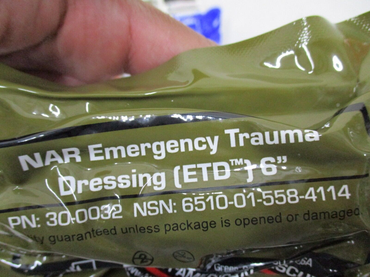 North American Rescue T.O.R.K Multicam IFAK tactical first aid kit in camouflage pouch