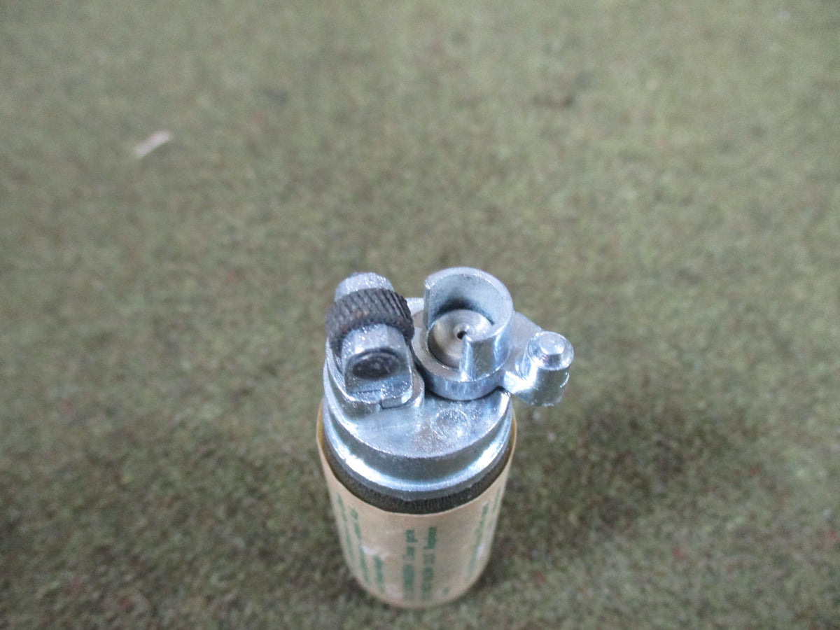 1974 Lifesaver USGI aviator survival lighter firestarter, NOS empty display-only case at an angle